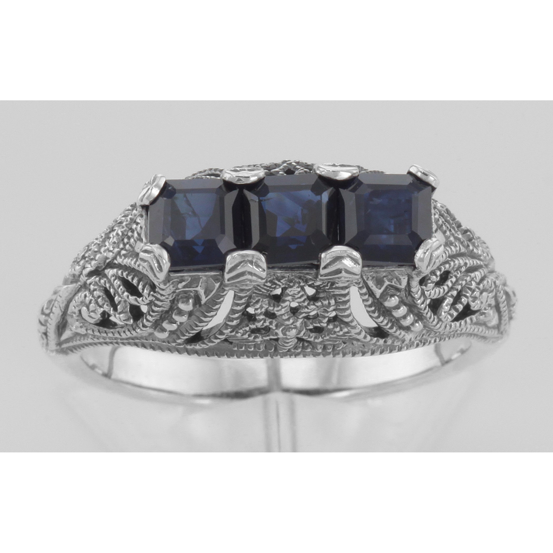 Detail view of Art Deco Style Filigree Ring 3 Princess Cut Blue Sapphires Sterling Silver highlighting Sapphire