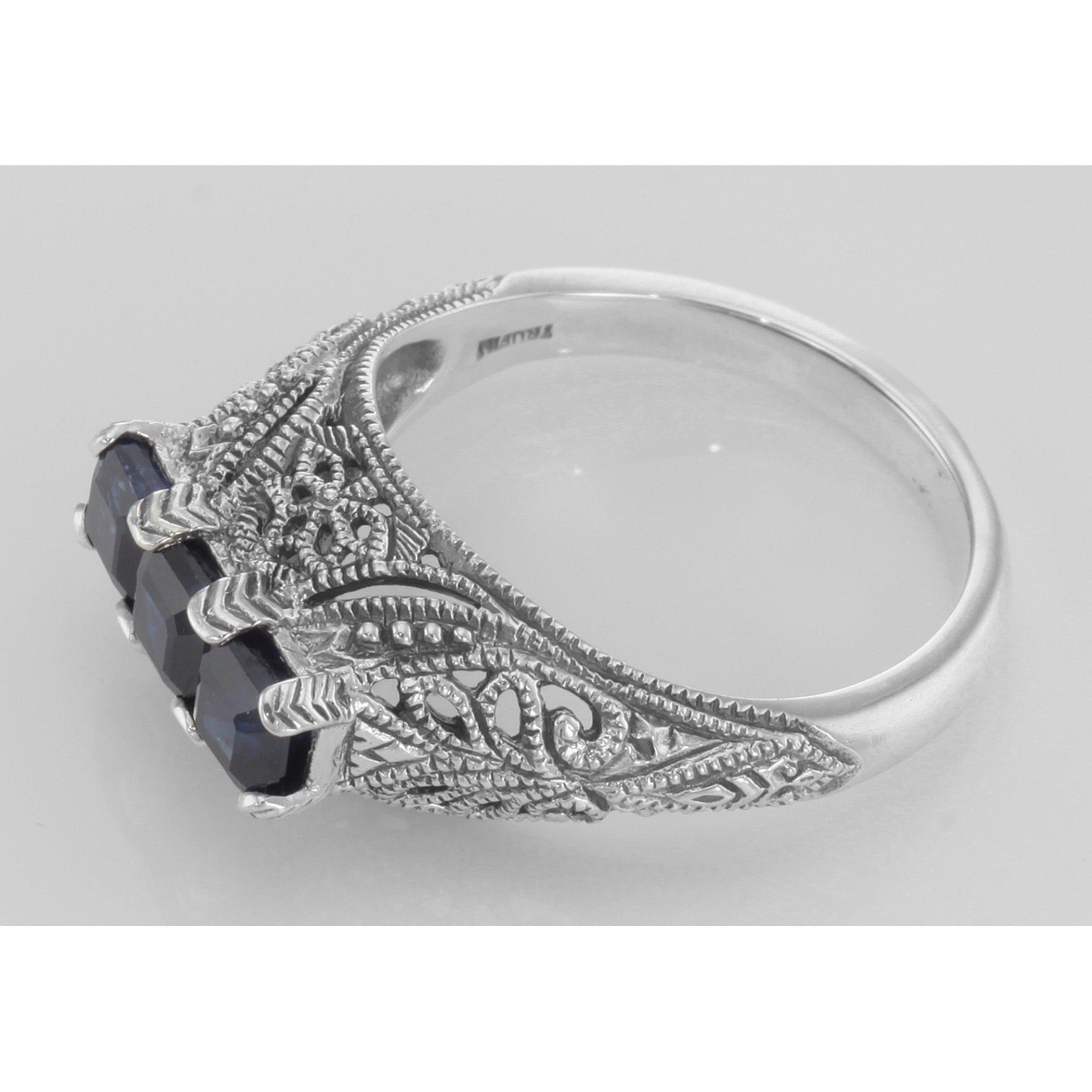 Back view of Art Deco Style Filigree Ring 3 Princess Cut Blue Sapphires Sterling Silver showing 925 sterling silver hallmark