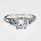 Detail view of Art Deco Filigree Ring w/ White Topaz and Blue Sapphires highlighting White Topaz, Sapphire