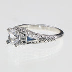 Detail view of Art Deco Filigree Ring w/ White Topaz and Blue Sapphires highlighting White Topaz, Sapphire