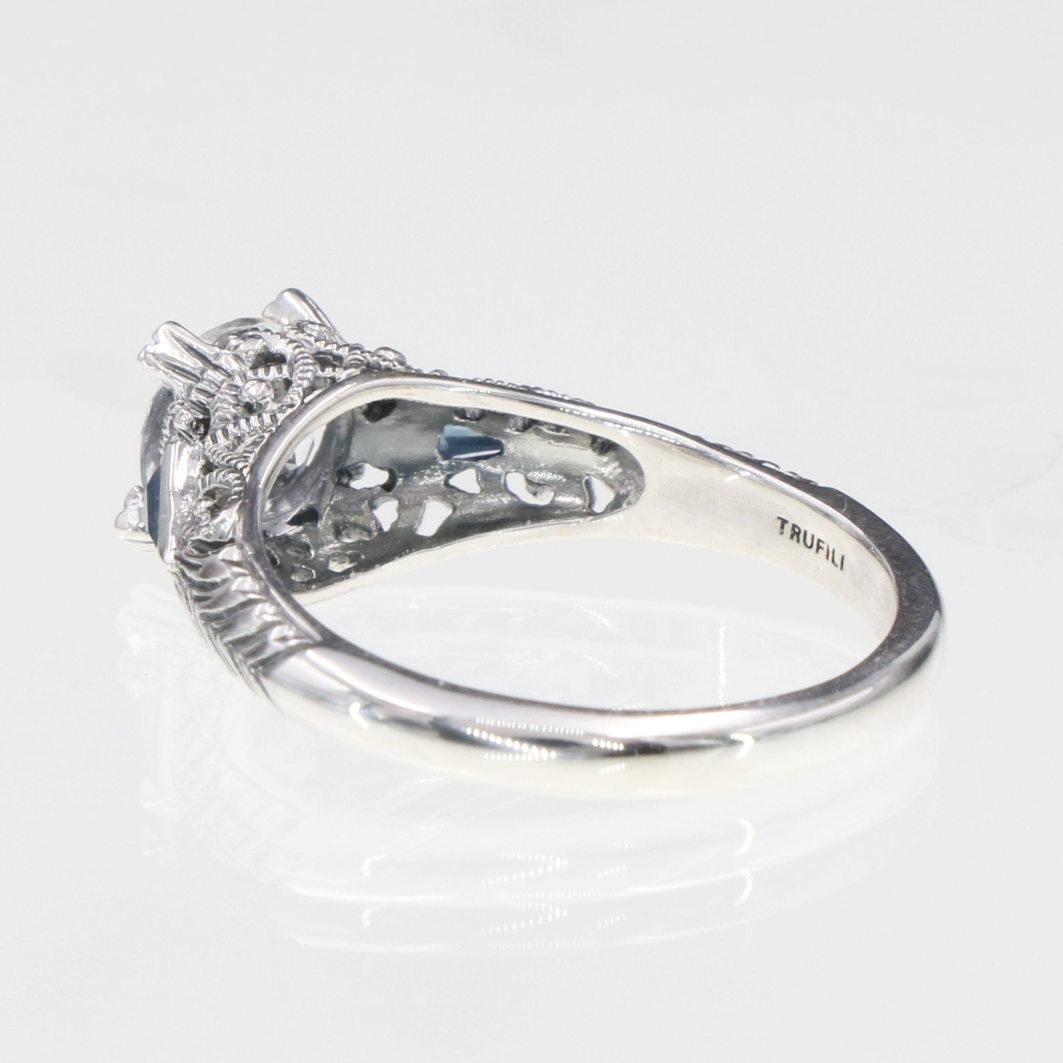 Back view of Art Deco Filigree Ring w/ White Topaz and Blue Sapphires showing 925 sterling silver hallmark