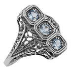 Filigree, Blue Topaz, sterling silver rings, front view