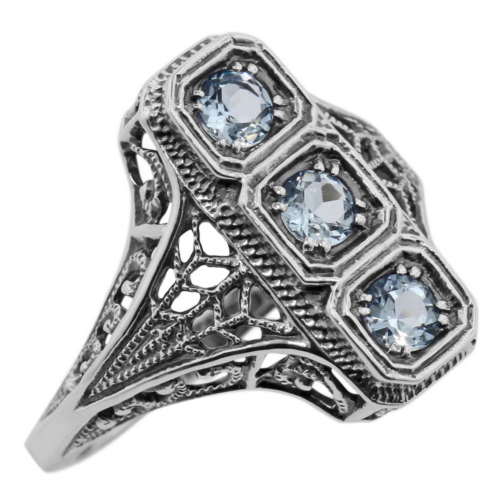 Filigree, Blue Topaz, sterling silver rings, front view