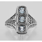 Back view of 3 Stone Blue Topaz Filigree Ring showing 925 sterling silver hallmark