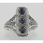 Detail view of Filigree Ring w/ Sapphire highlighting Sapphire