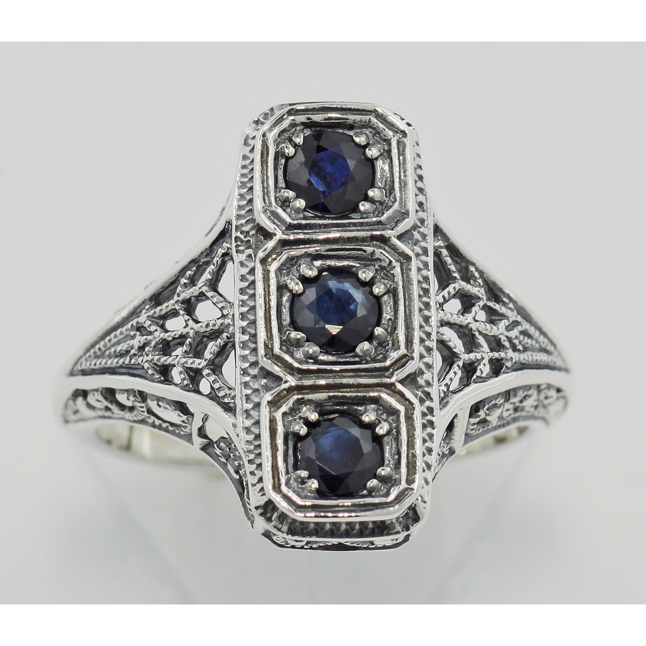 Detail view of Filigree Ring w/ Sapphire highlighting Sapphire