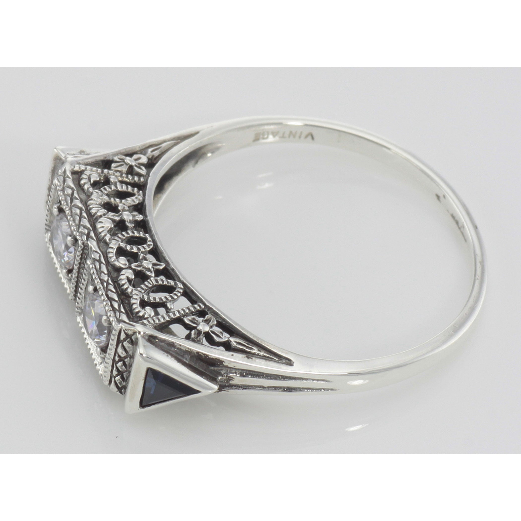 Back view of Art Deco Style White Topaz Filigree Ring 2 Blue Sapphire Sterling Silver showing 925 sterling silver hallmark