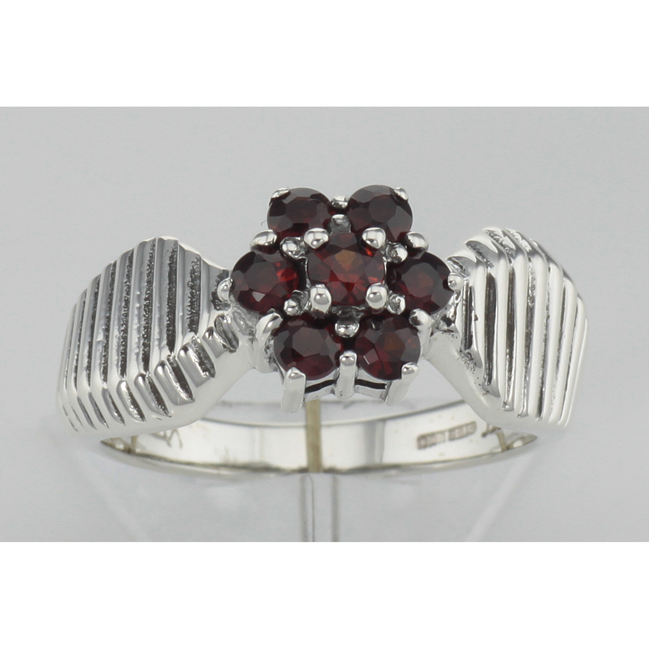Detail view of Beautiful Genuine Red Garnet Floral Design Ring highlighting Garnet
