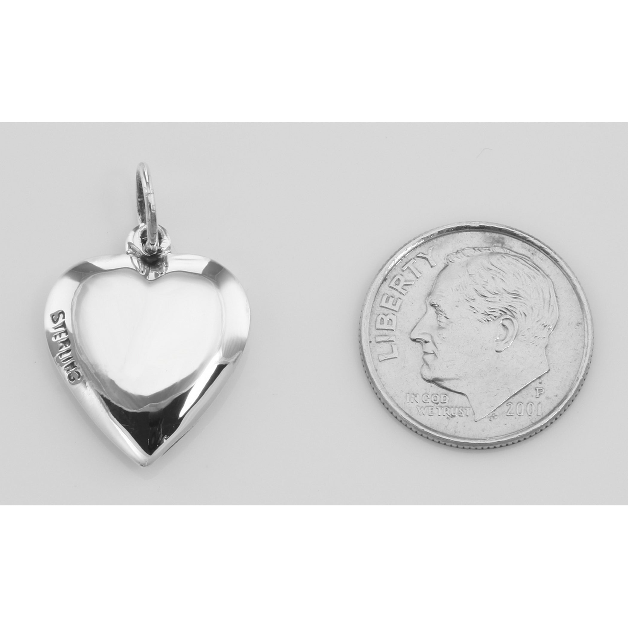 Back view of Antique Border Design Heart Charm or Pendant showing 925 sterling silver hallmark and spring ring clasp