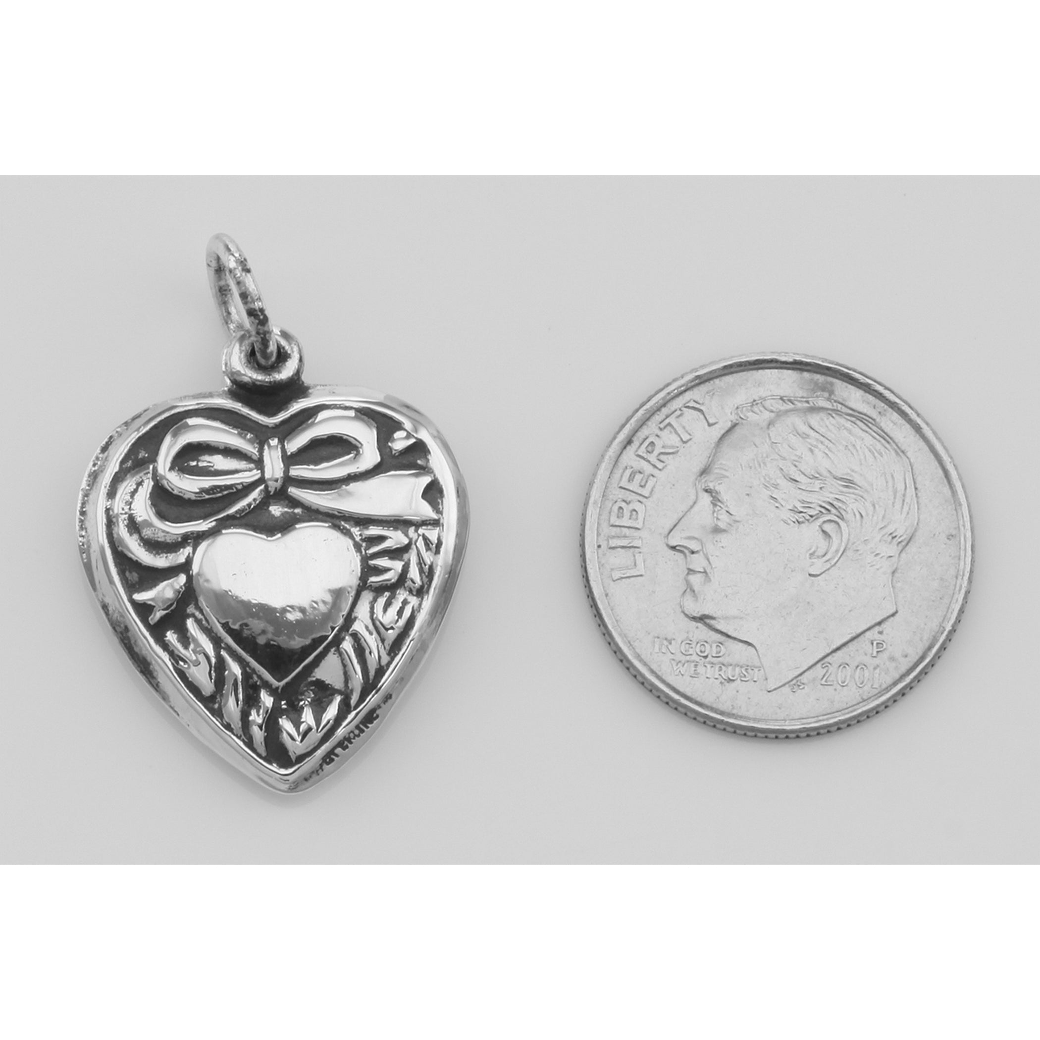 Back view of Ribbon Design Heart Charm or Pendant showing 925 sterling silver hallmark and spring ring clasp