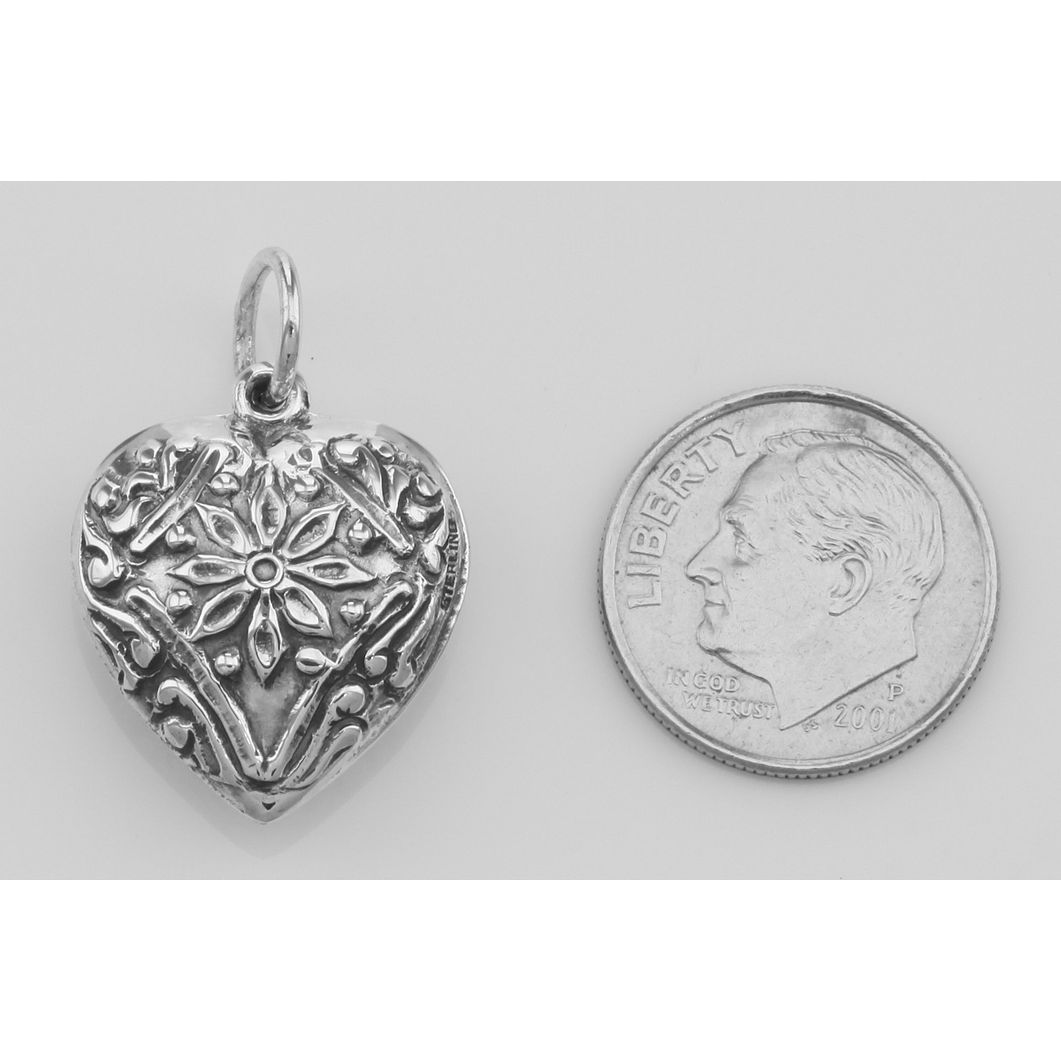 Back view of Antique Style Floral Heart Charm or Pendant showing 925 sterling silver hallmark and spring ring clasp