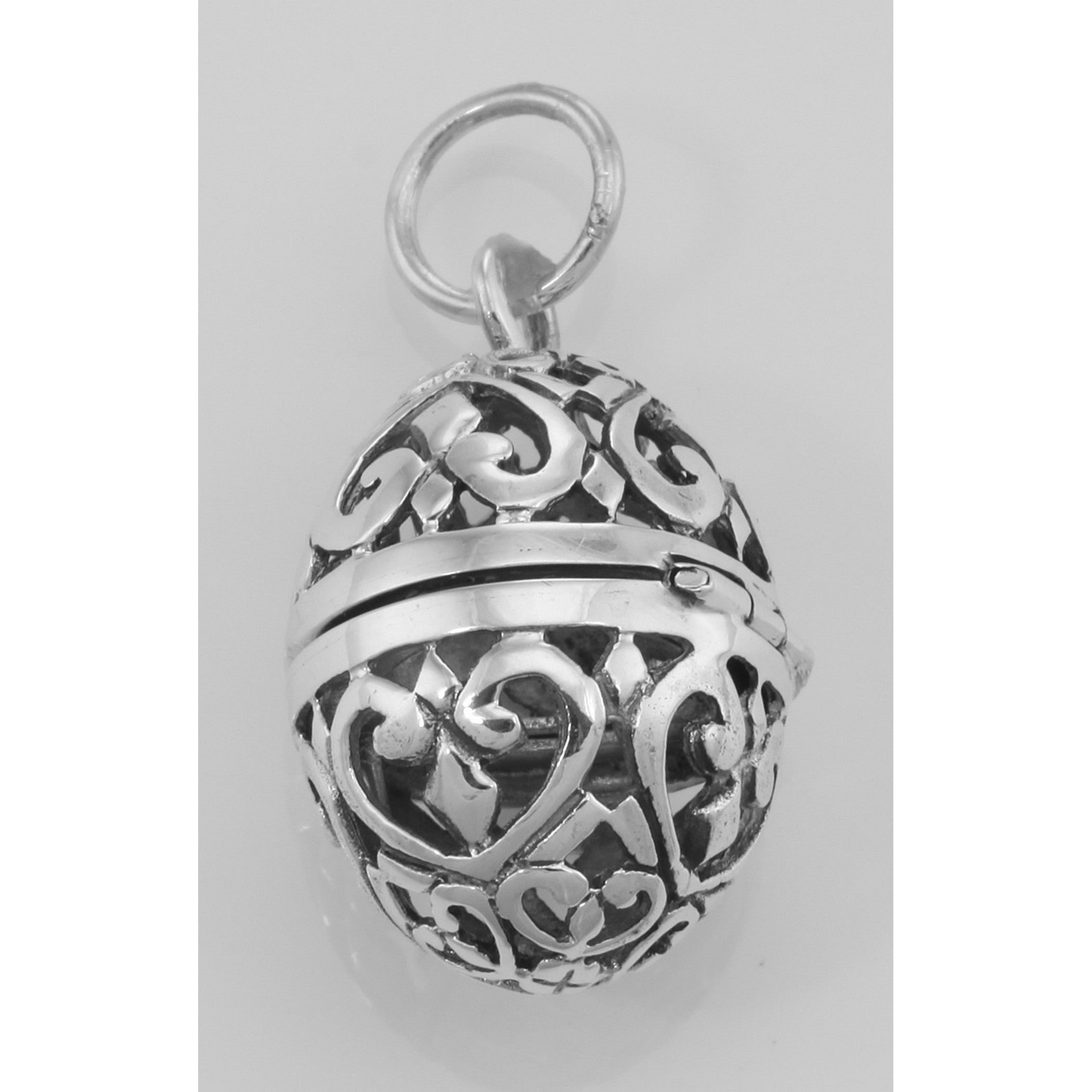Detail view of Egg Filigree Aromatherapy Locket Pendant highlighting design details