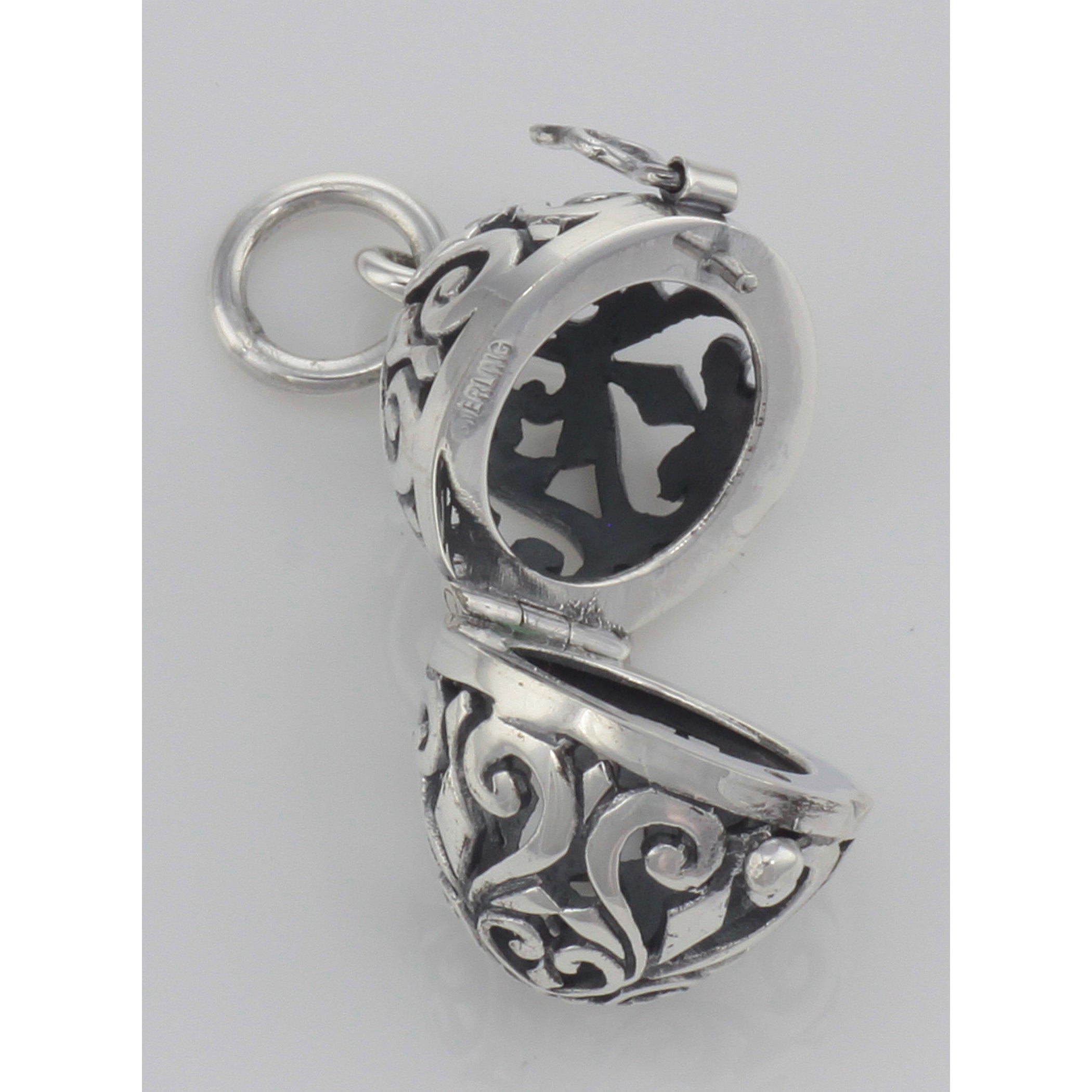 Back view of Egg Filigree Aromatherapy Locket Pendant with Front Clasp showing 925 sterling silver hallmark and spring ring c