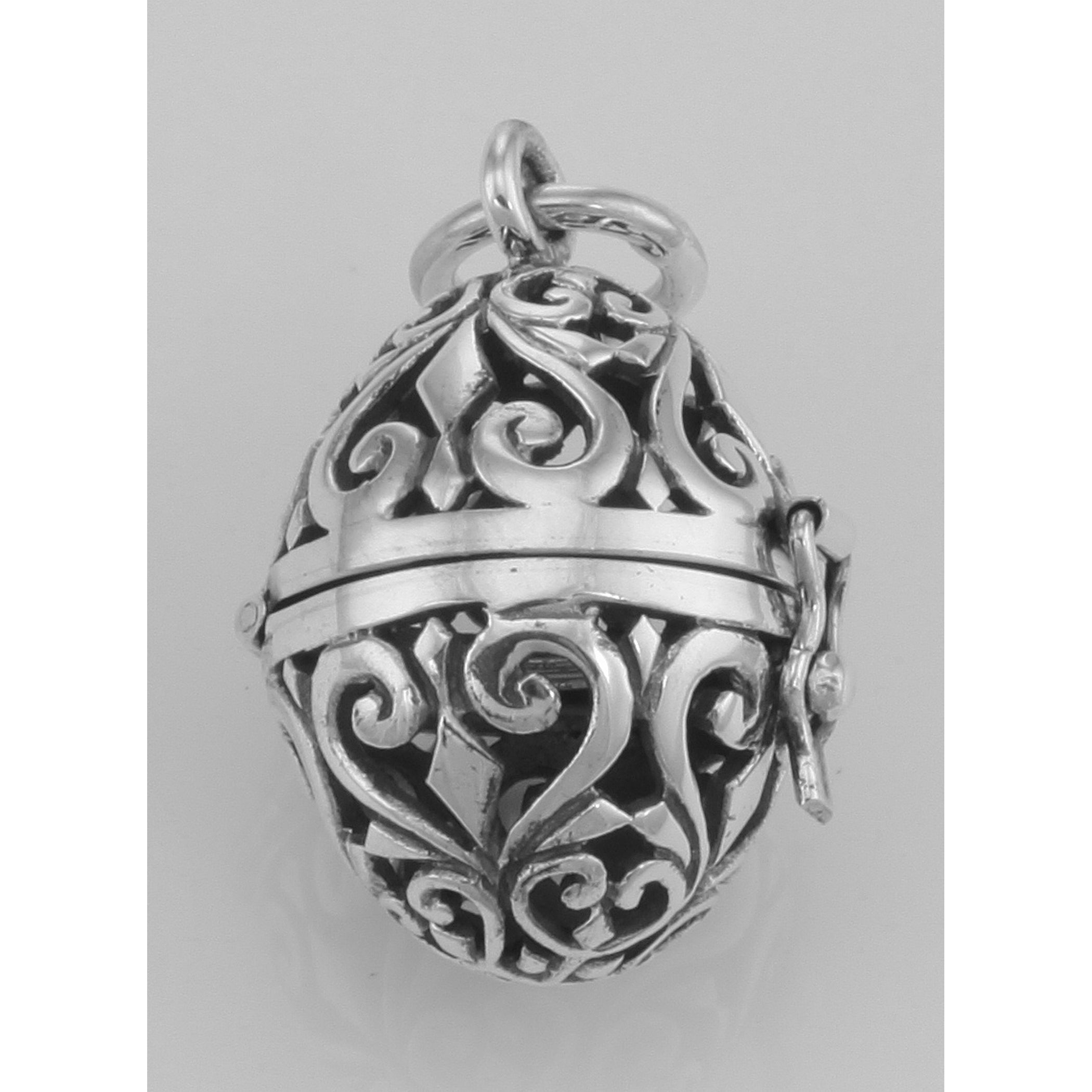 Detail view of Egg Filigree Aromatherapy Locket Pendant with Front Clasp highlighting design details