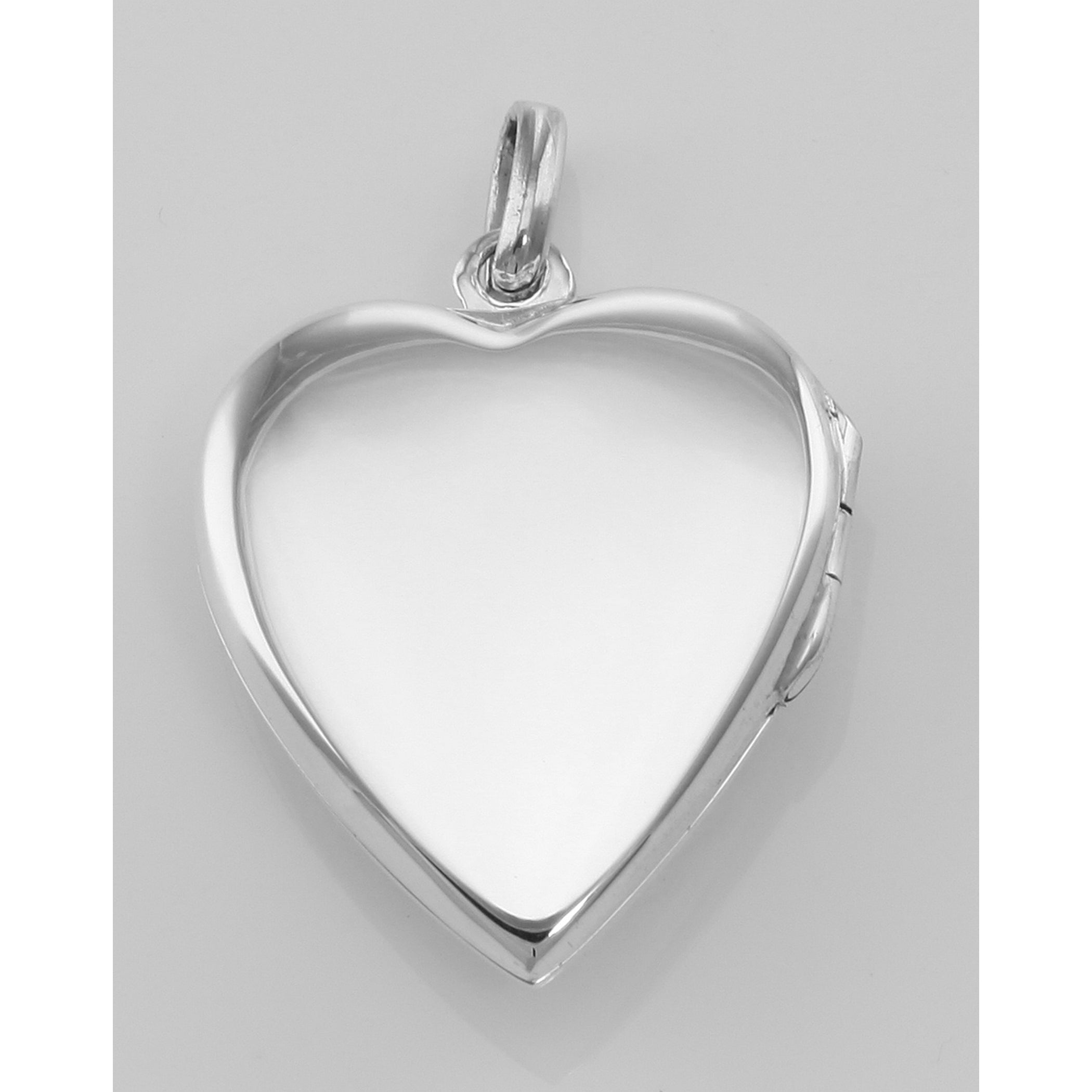 Detail view of Heart Shaped Cat Sterling Silver Locket Pendant highlighting design details