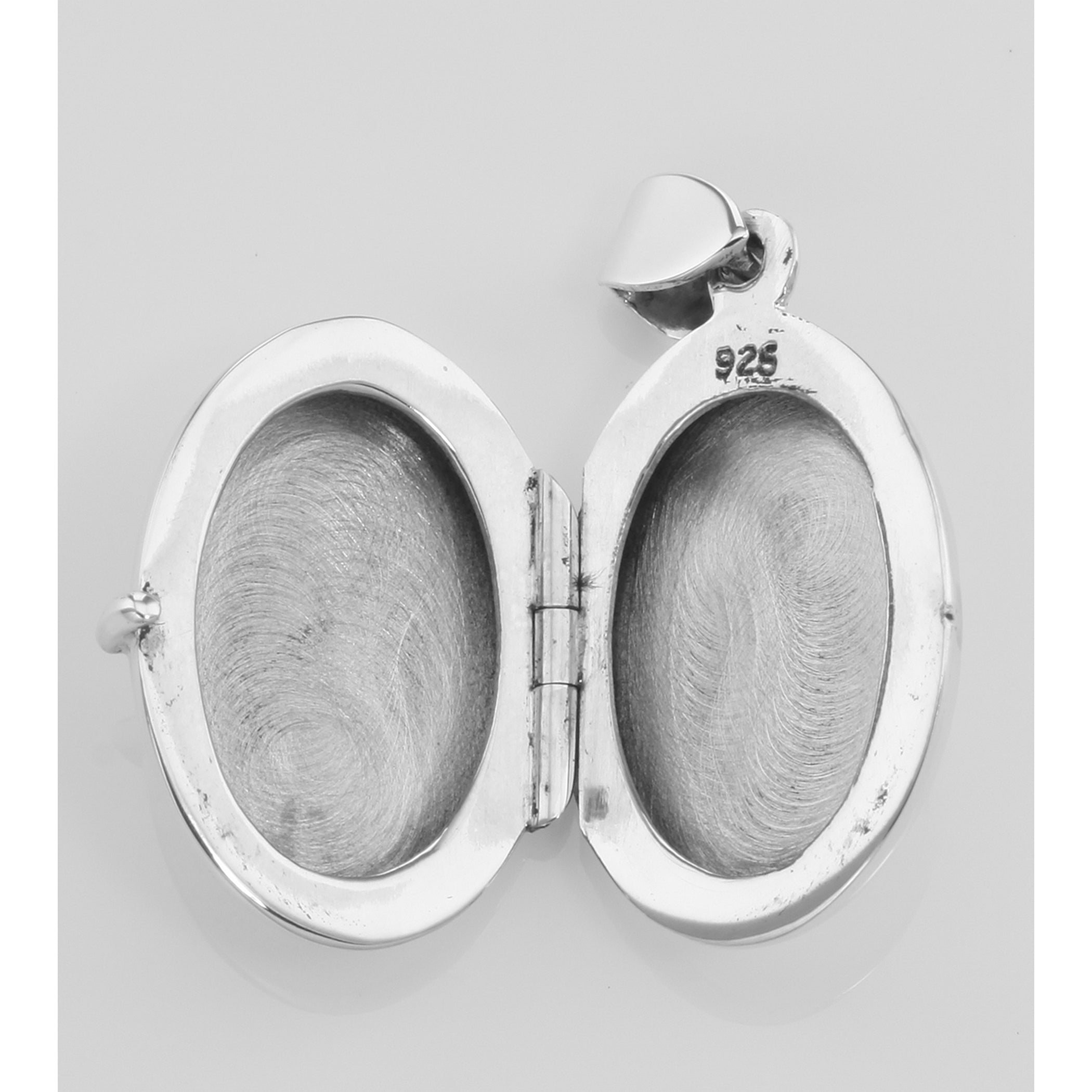 Back view of Etched Border Design Oval Locket - Engravable showing 925 sterling silver hallmark and spring ring clasp