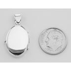 Detail view of Etched Border Design Oval Locket - Engravable highlighting design details