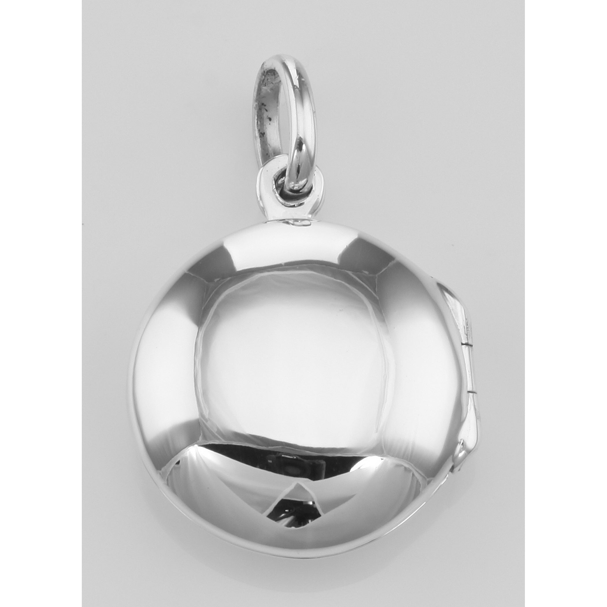Detail view of Small Round Sterling Silver Locket highlighting design details