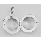 Back view of Small Round Sterling Silver Locket showing 925 sterling silver hallmark and spring ring clasp