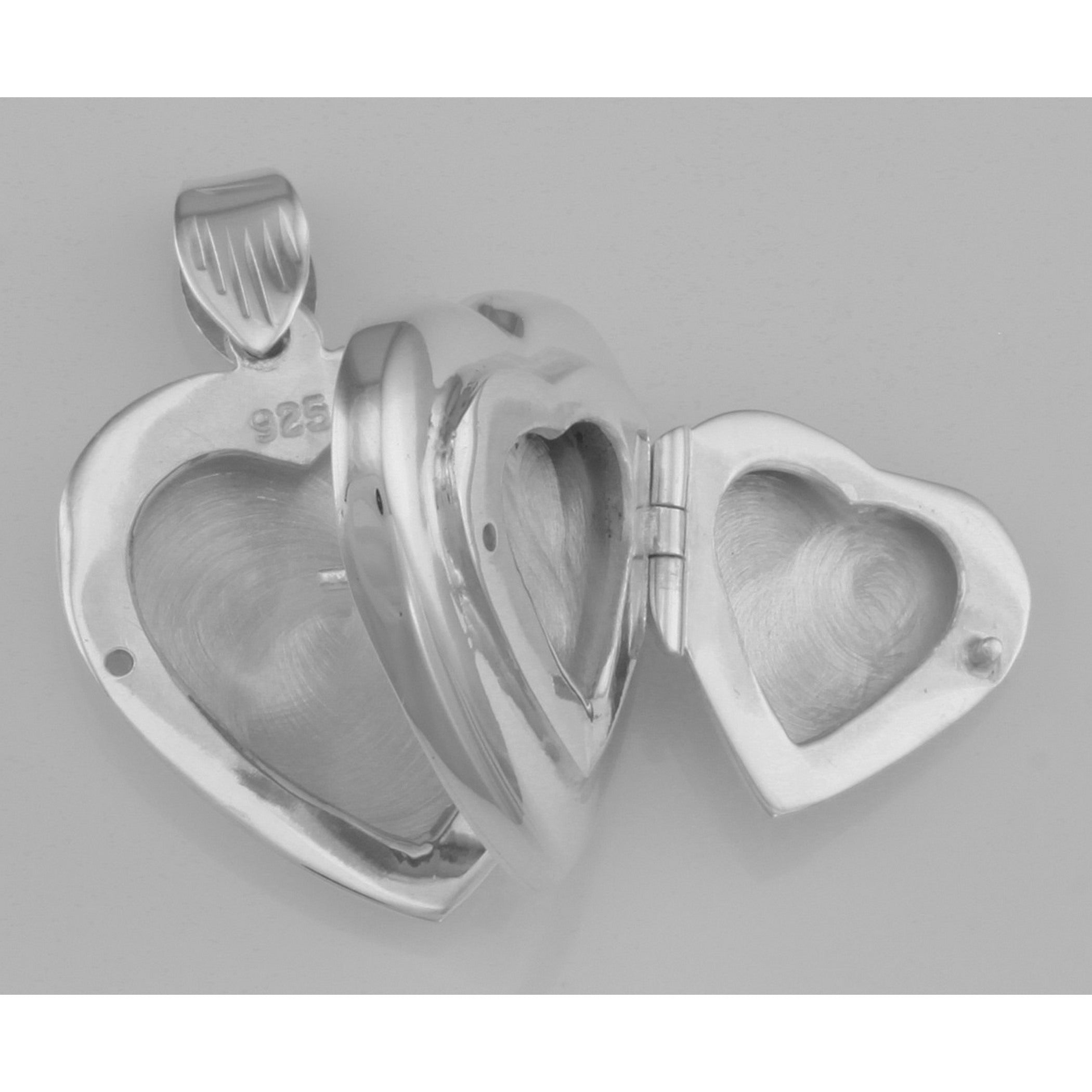 Back view of Vintage Style Double Heart Locket Pendant in Fine Sterling Silver showing 925 sterling silver hallmark and sprin