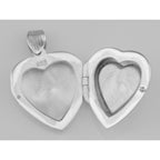 Detail view of Vintage Style Double Heart Locket Pendant in Fine Sterling Silver highlighting design details