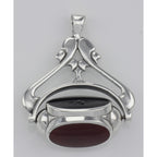 Back view of Antique Style 3 Stone Spinning Fob Pendant showing 925 sterling silver hallmark and spring ring clasp