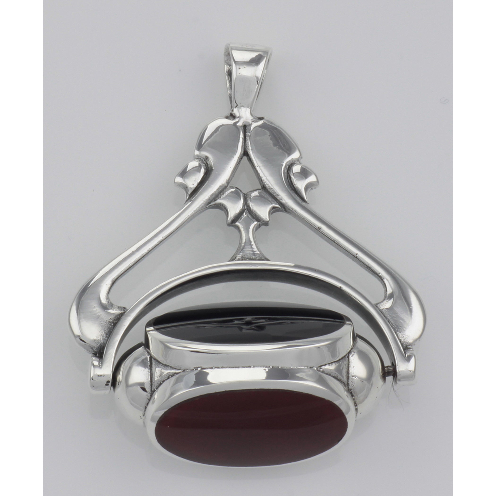Back view of Antique Style 3 Stone Spinning Fob Pendant showing 925 sterling silver hallmark and spring ring clasp