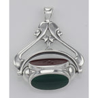 Detail view of Antique Style 3 Stone Spinning Fob Pendant highlighting design details