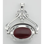 Detail view of Antique Style 3 Stone Spinning Fob Pendant highlighting design details