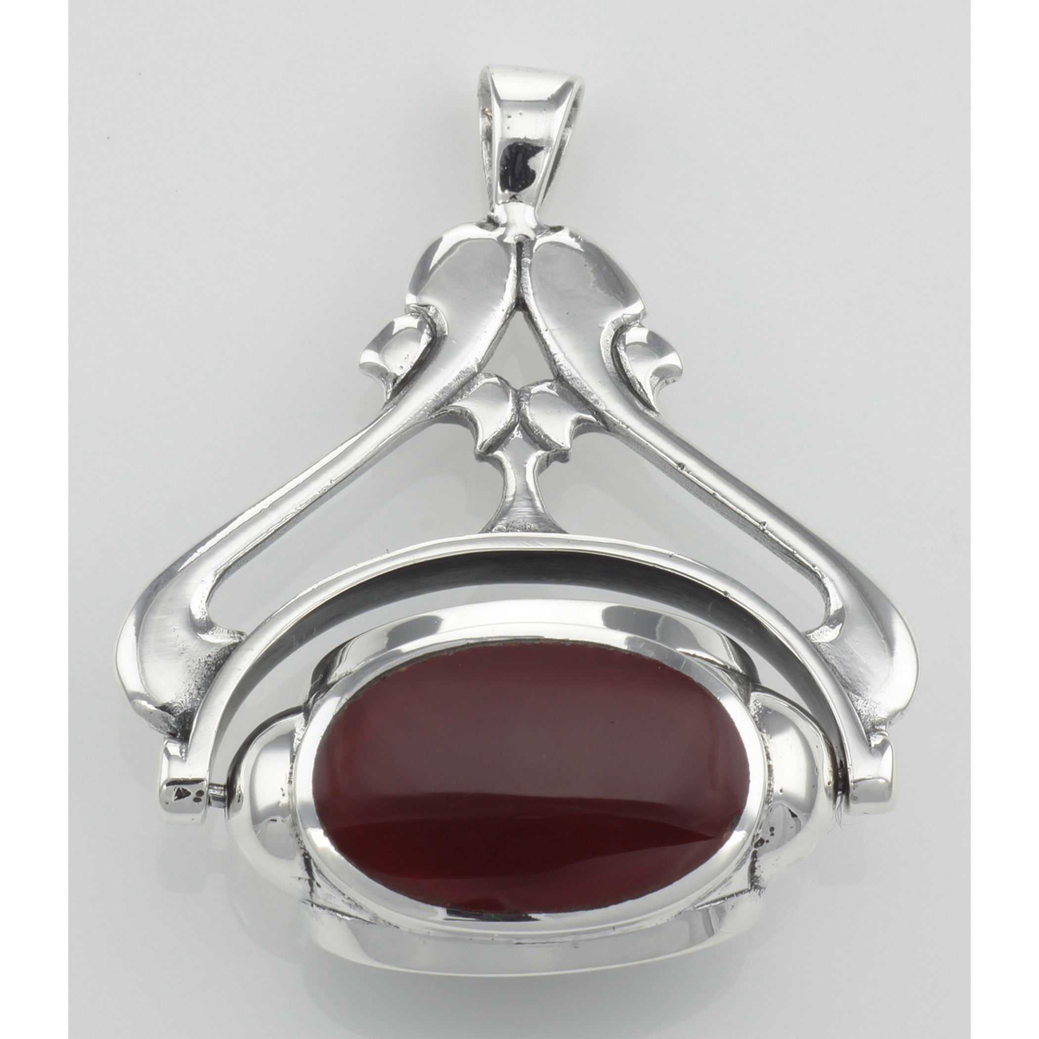 Detail view of Antique Style 3 Stone Spinning Fob Pendant highlighting design details