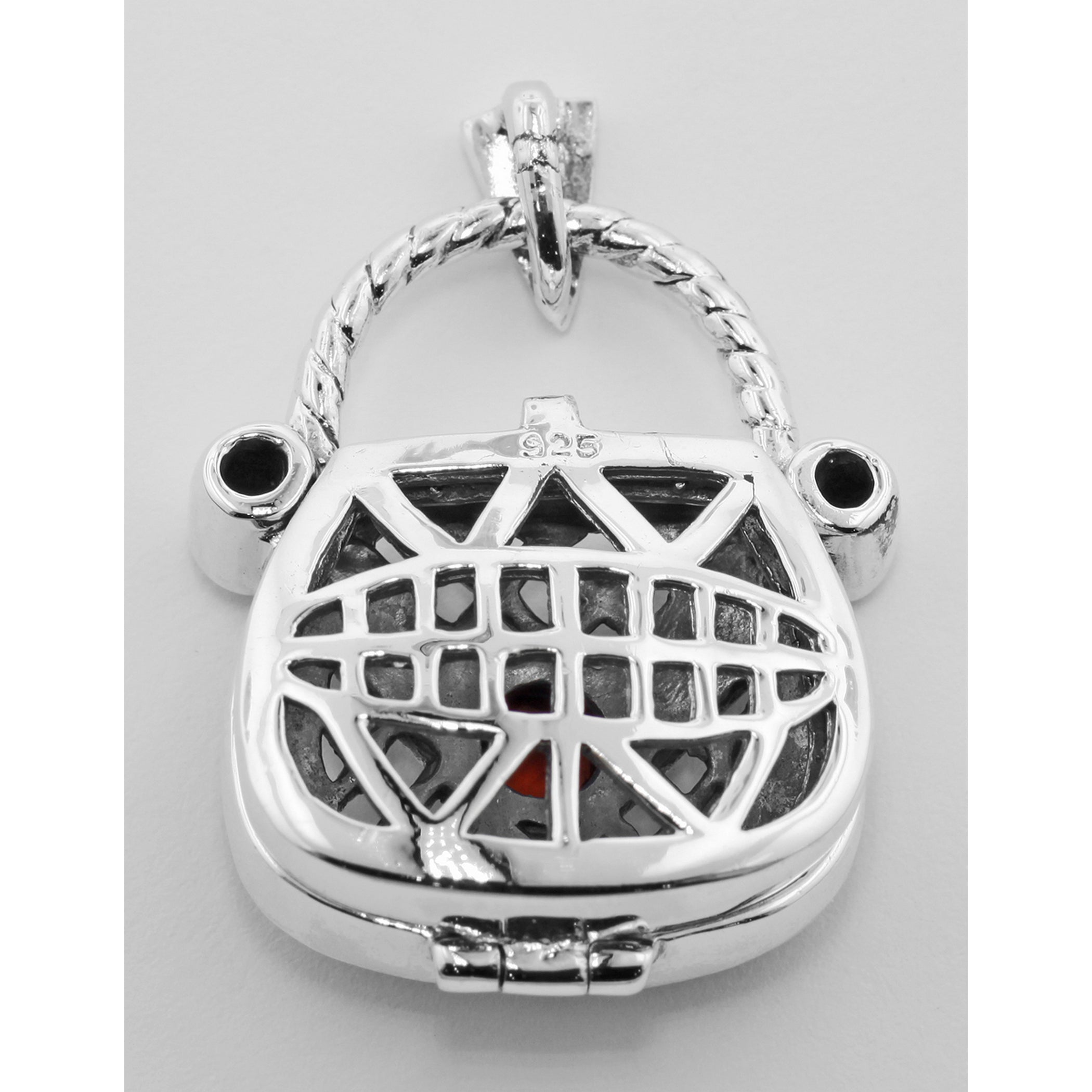 Detail view of Garnet Purse Pendant / Pillbox highlighting Garnet