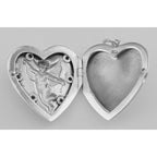 Back view of Cherub Heart Sterling Silver Locket Pendant with Blue CZ's showing 925 sterling silver hallmark and spring ring 