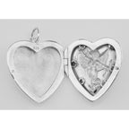 Detail view of Cherub Heart Locket Pendant Red CZ's highlighting CZ