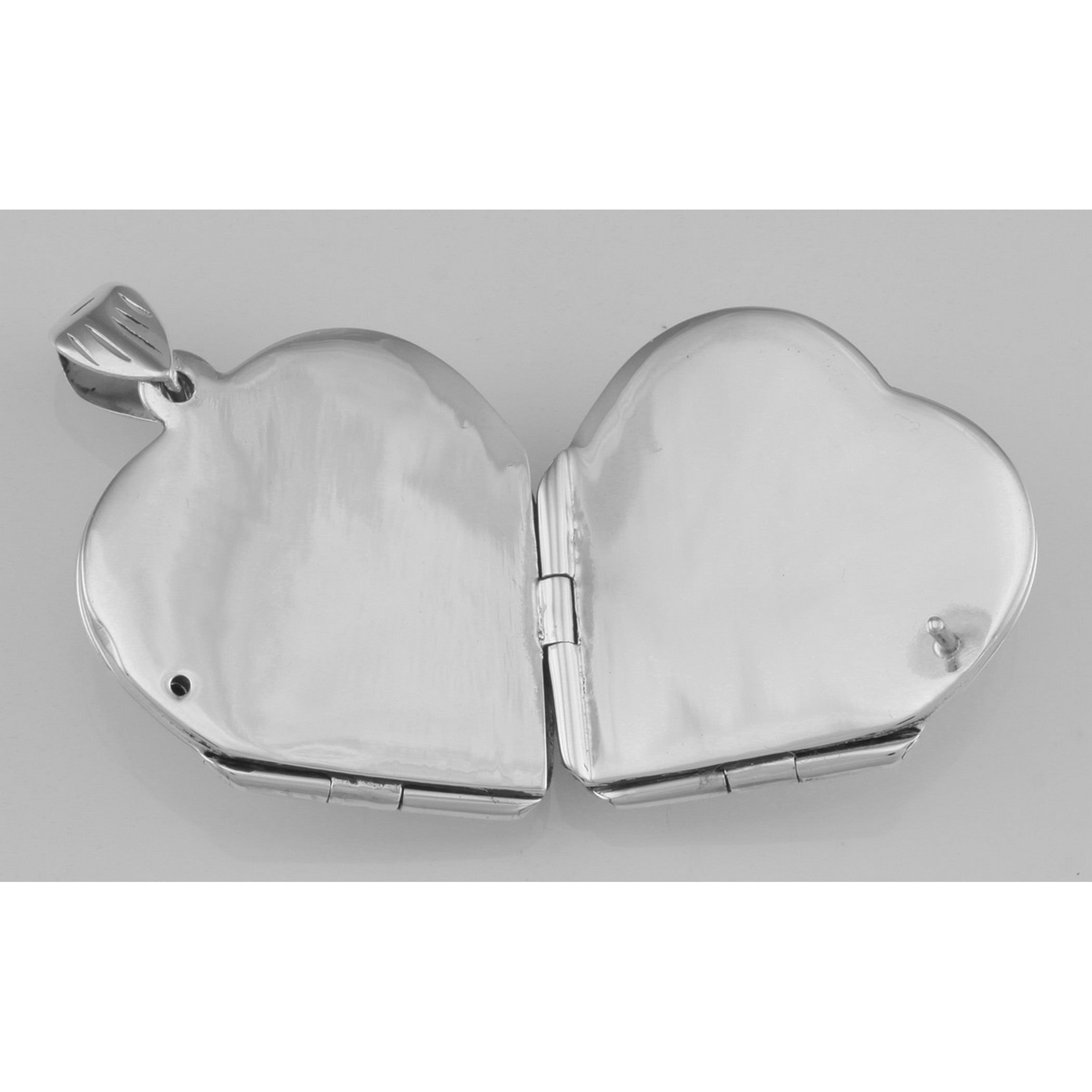 Detail view of Beautiful Sterling Silver Heart Locket Pendant - 4 Photo Large Clover highlighting design details