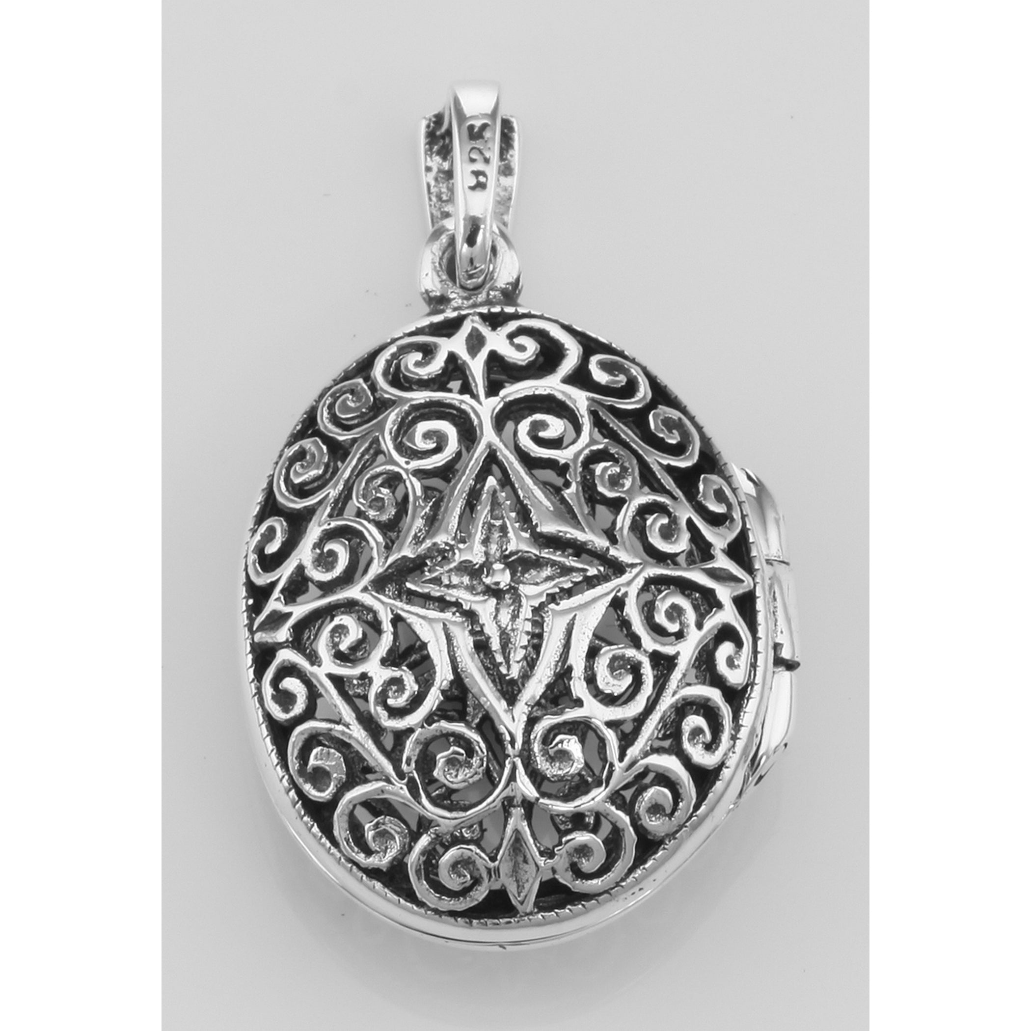 Back view of Oval Filigree Vinaigrette Aromatherapy Locket Pendant showing 925 sterling silver hallmark and spring ring clasp