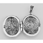 Detail view of Oval Filigree Vinaigrette Aromatherapy Locket Pendant highlighting design details