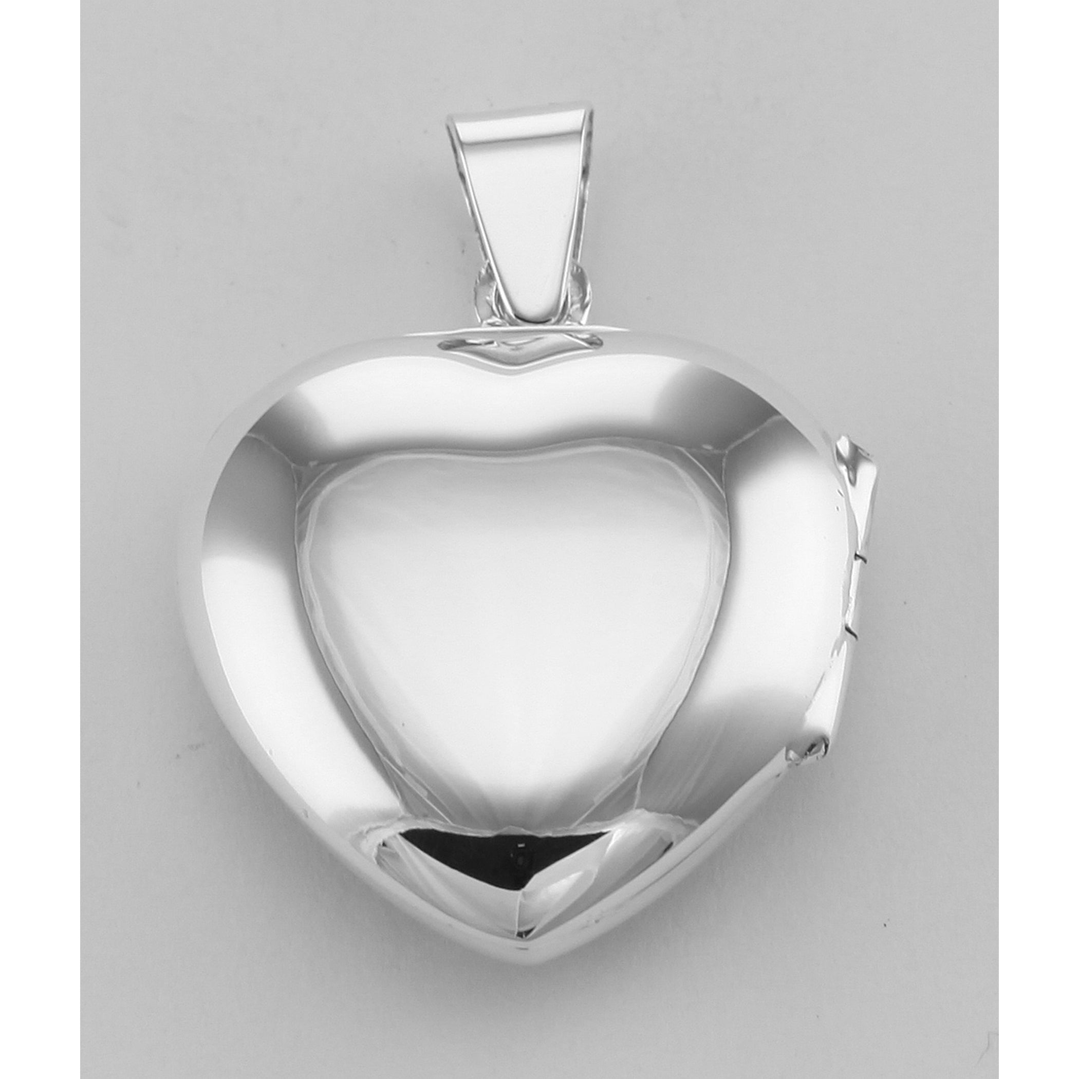 Detail view of Antique Style Scroll Design Filigree Heart Locket - Solid Back highlighting design details