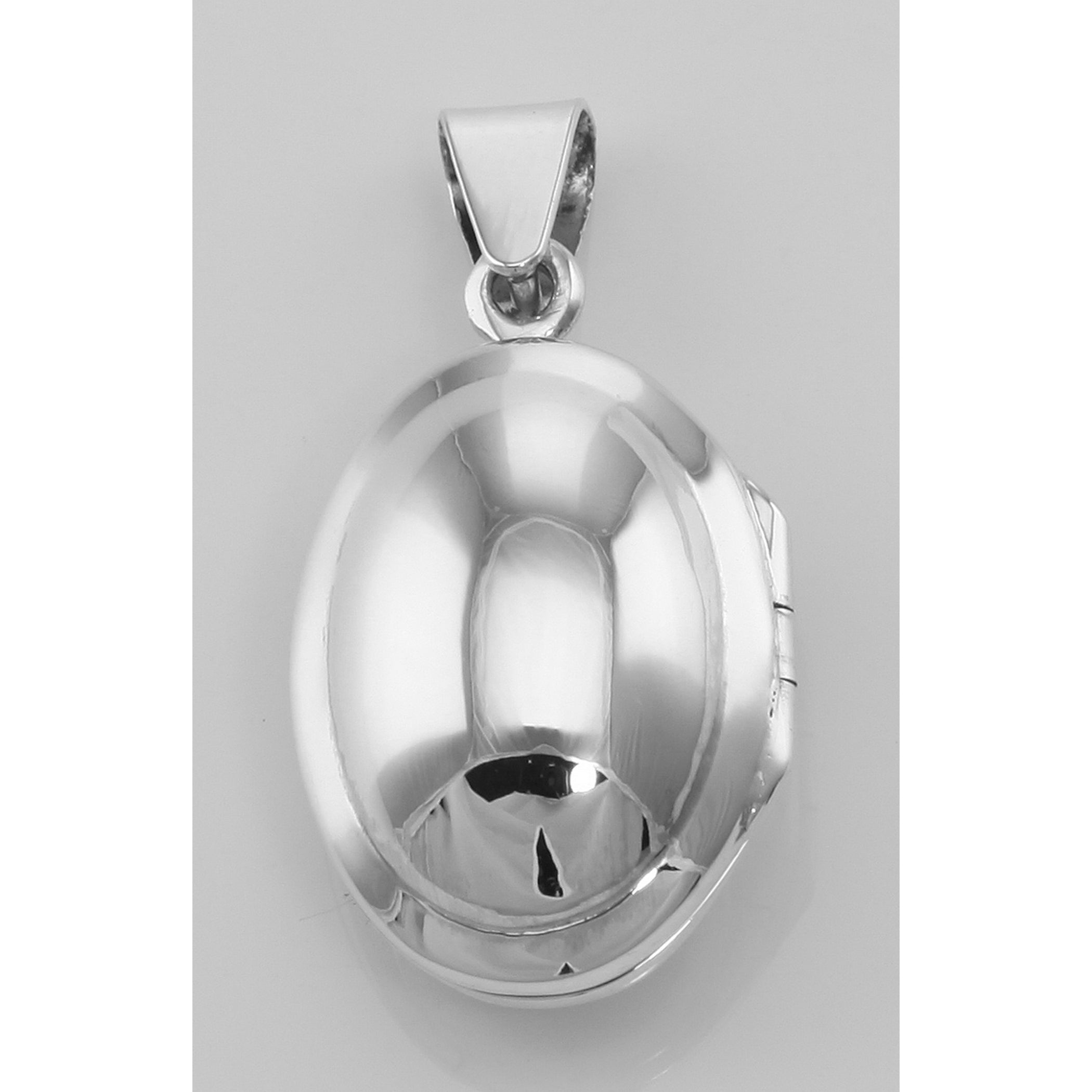 Detail view of Classic Celtic Knot Design Sterling Silver Oval Filigree Locket highlighting design details