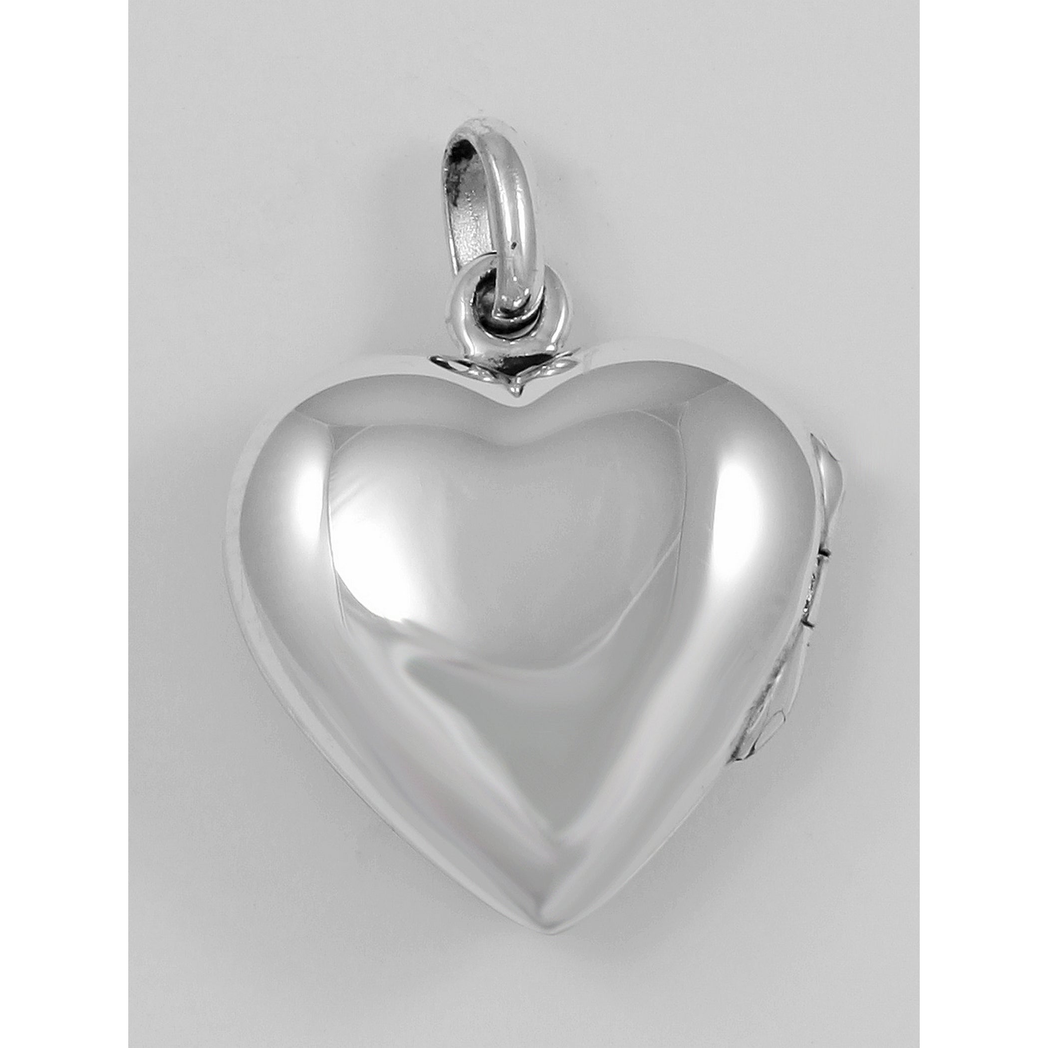 Detail view of Rose Heart Filigree Locket highlighting design details