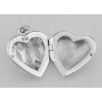 Back view of Filigree Heart Locket - Aromatherapy Locket showing 925 sterling silver hallmark and spring ring clasp