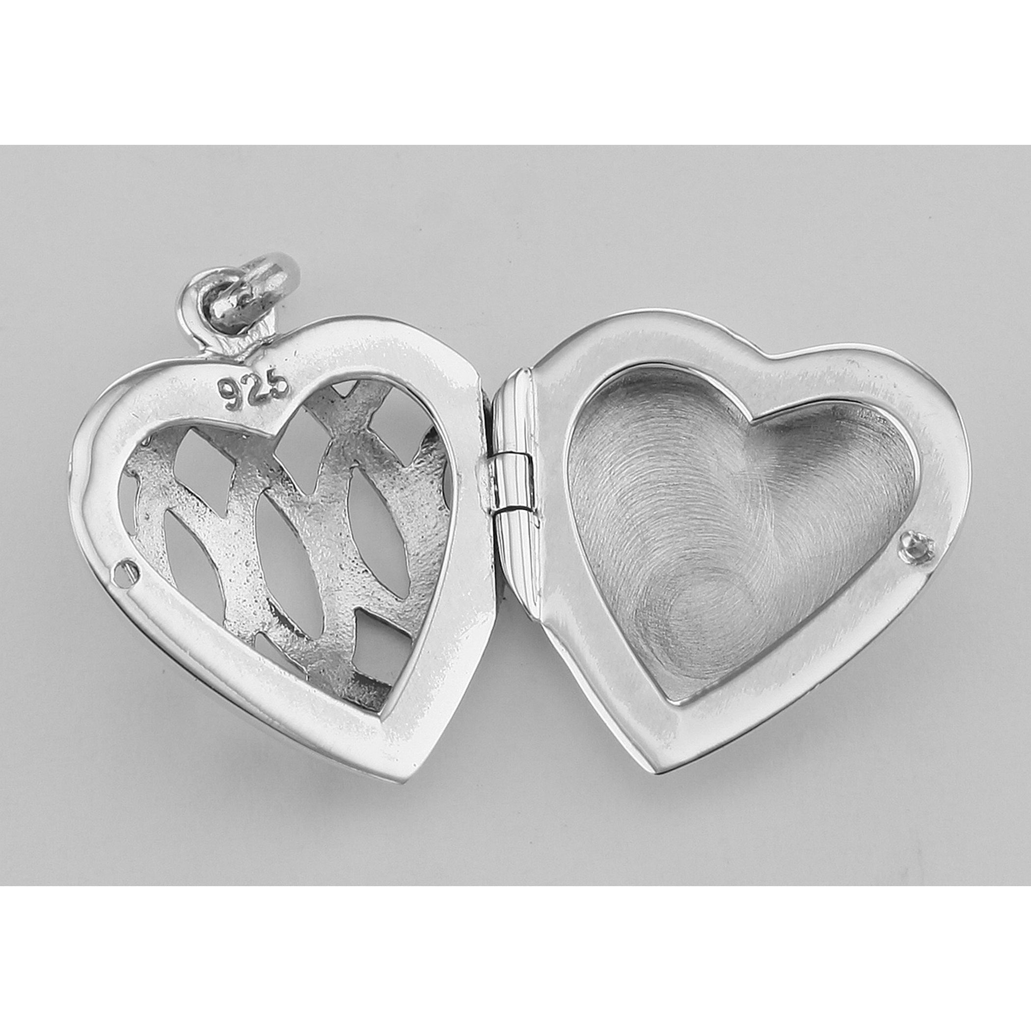 Back view of Filigree Heart Locket - Aromatherapy Locket showing 925 sterling silver hallmark and spring ring clasp
