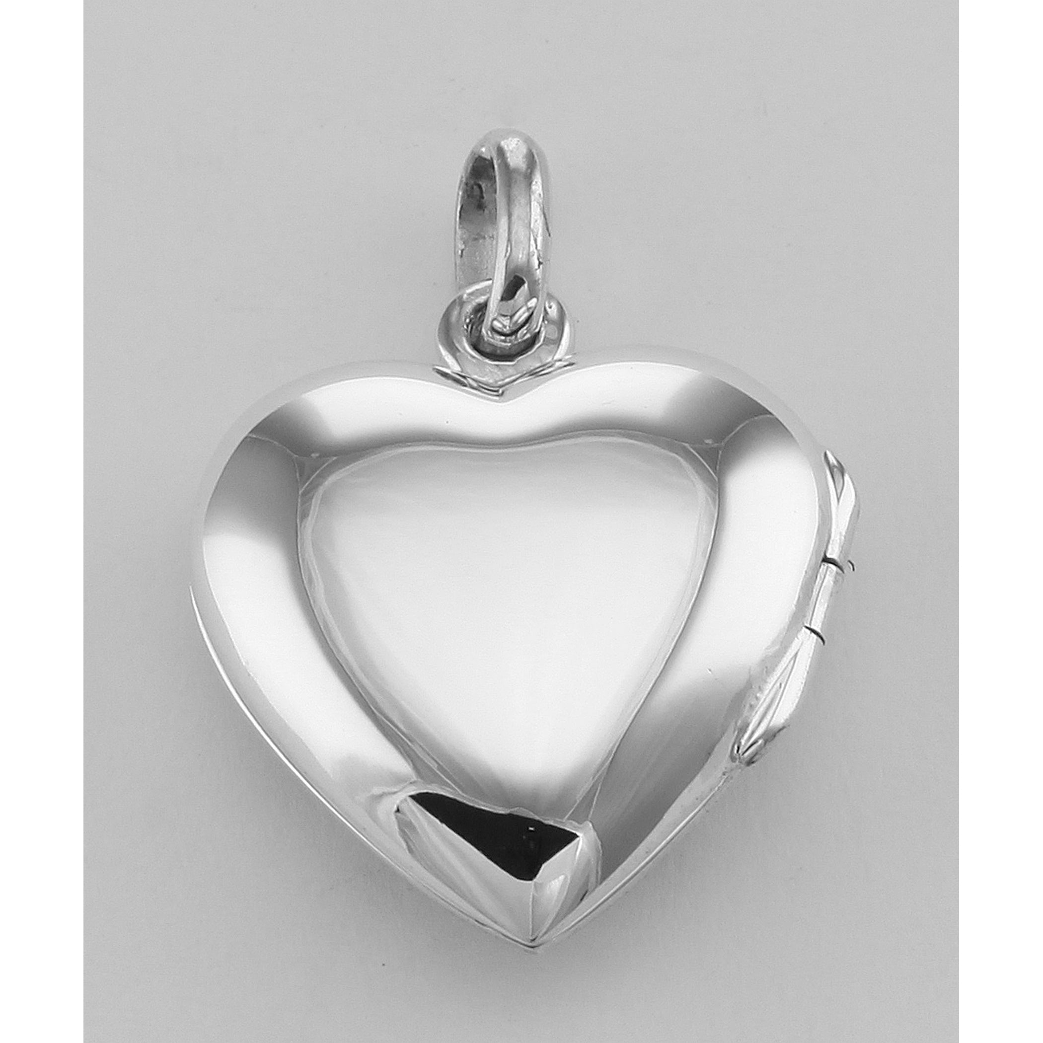 Detail view of Filigree Heart Locket - Aromatherapy Locket highlighting design details
