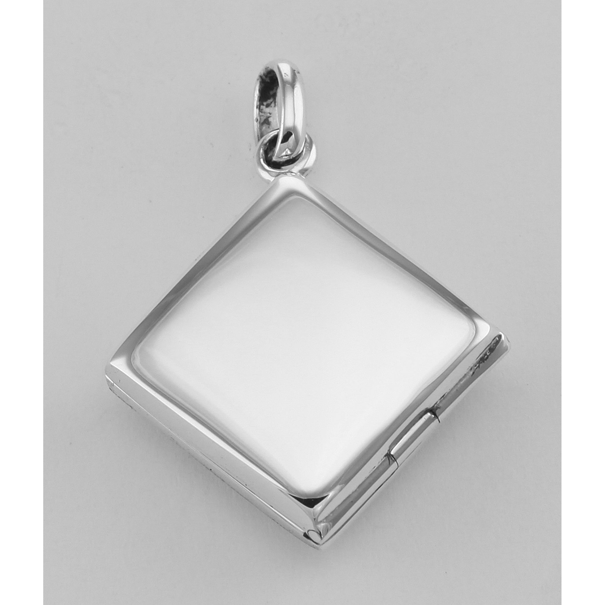Detail view of Filigree Diamond Shaped Locket - Aromatherapy Locket highlighting Diamond