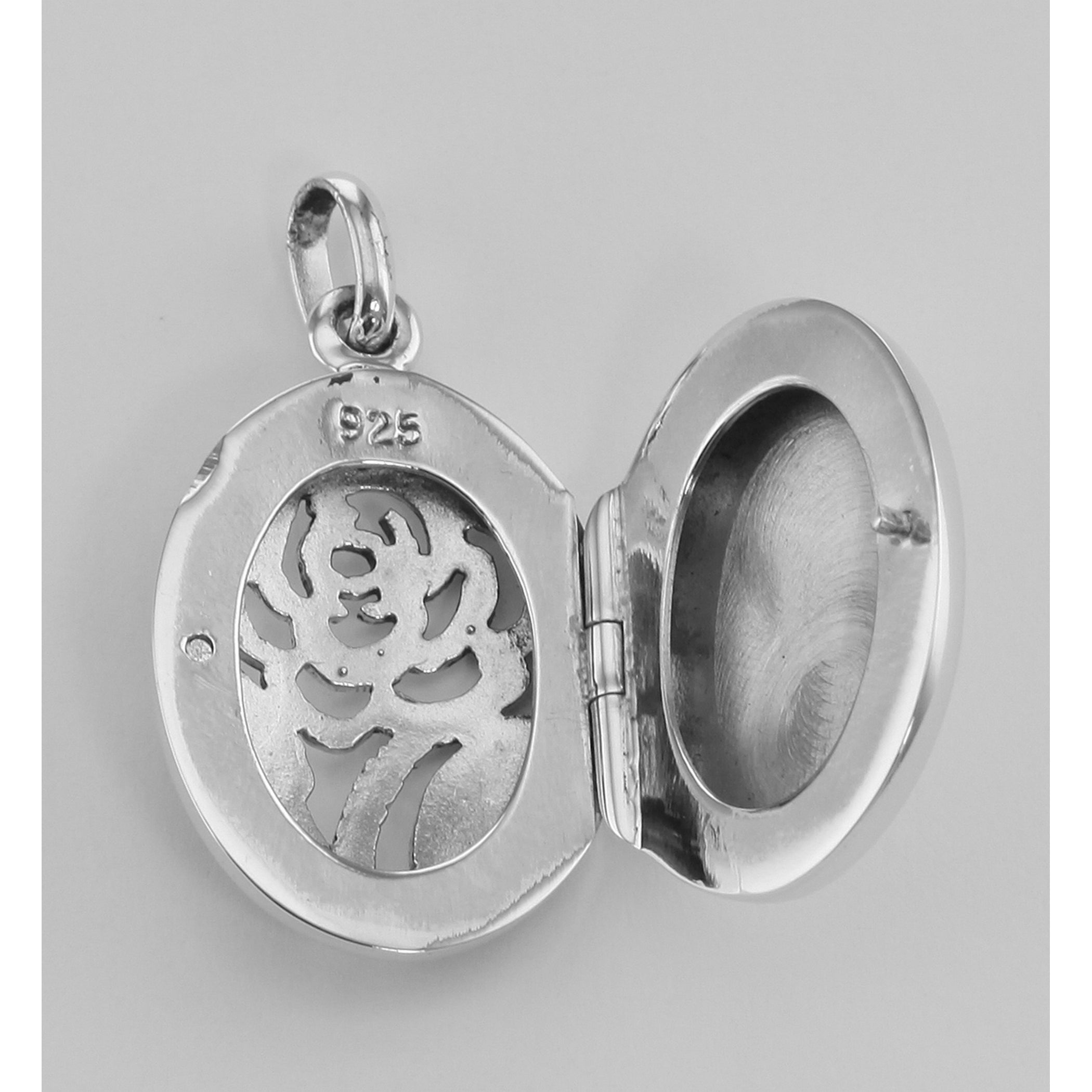 Back view of Filigree Rose Oval Locket - Aromatherapy Locket showing 925 sterling silver hallmark and spring ring clasp