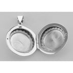 Back view of Antique Style Round Locket showing 925 sterling silver hallmark and spring ring clasp