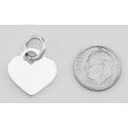 Back view of Small Heart Tag Charm Pendant showing 925 sterling silver hallmark and spring ring clasp