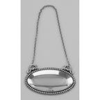 Detail view of Blank Liquor Decanter Label / Tag Oval beaded Border Sterling Silver highlighting design details