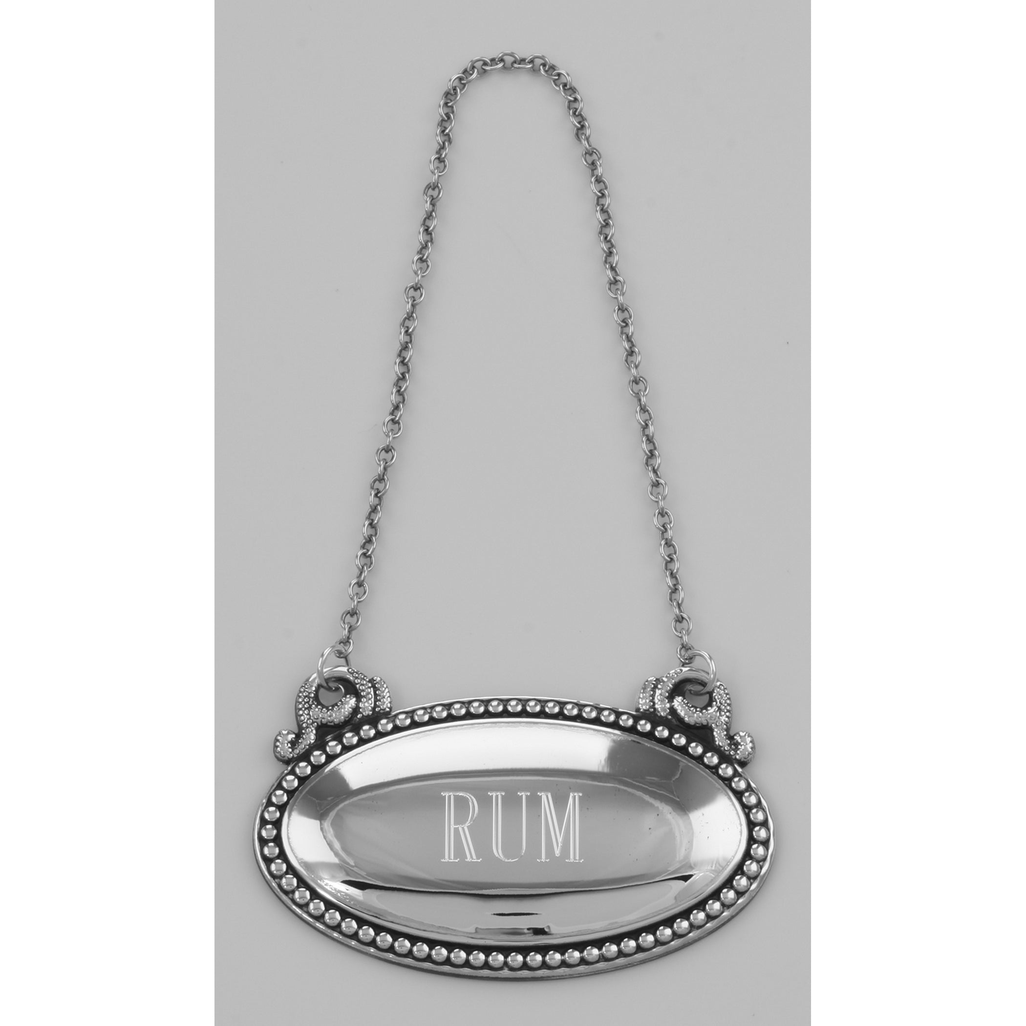 Detail view of Rum Liquor Decanter Label / Tag - Oval beaded Border - Made in USA highlighting design details