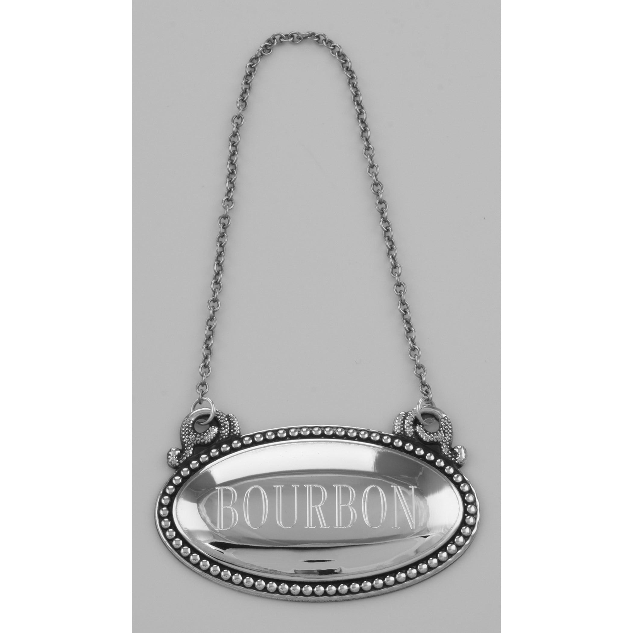 Detail view of Bourbon Liquor Decanter Label / Tag - Oval beaded Border - Made in USA highlighting design details