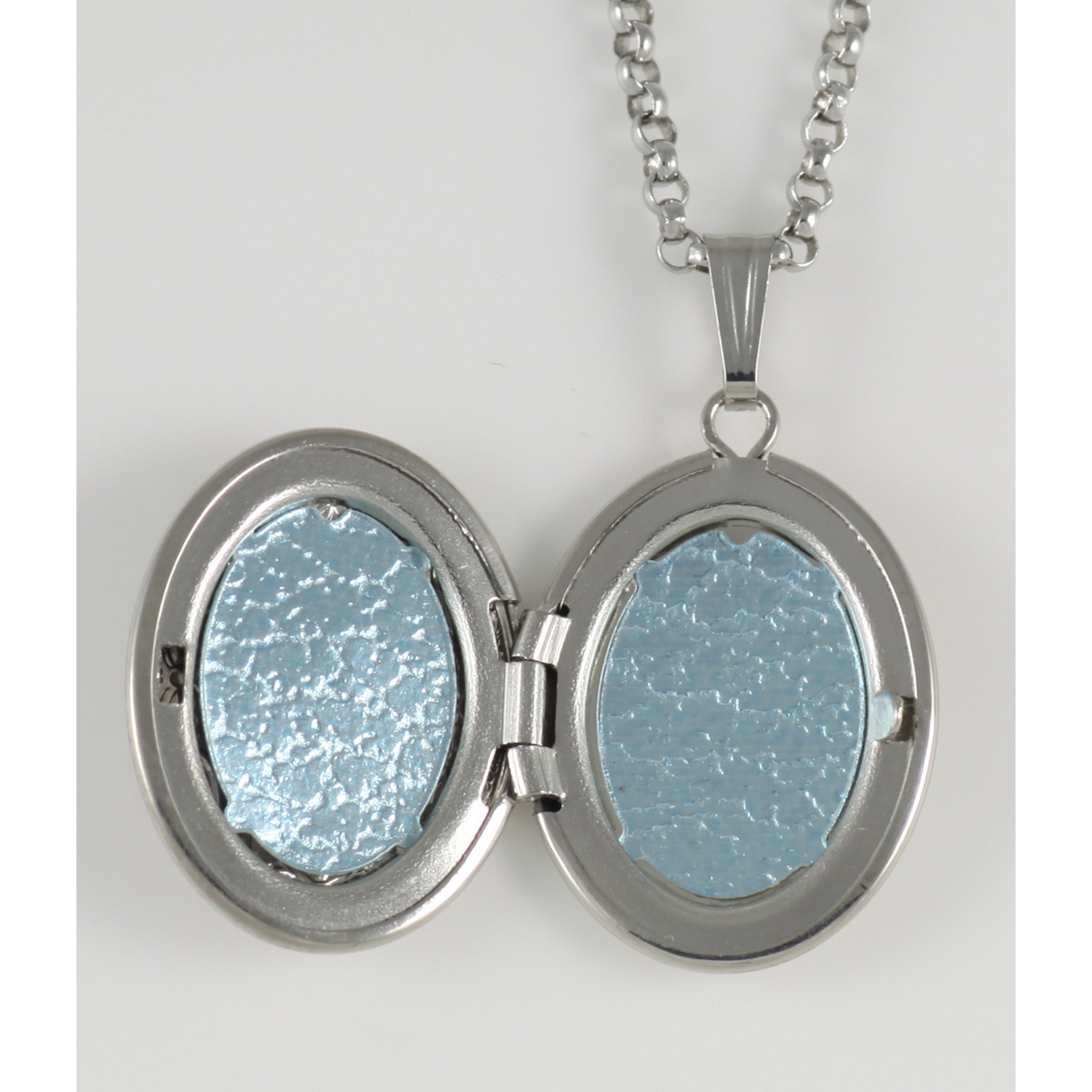 Back view of Sterling Oval Locket with 14kt Gold Cross - Made in USA showing 925 sterling silver hallmark and spring ring cla